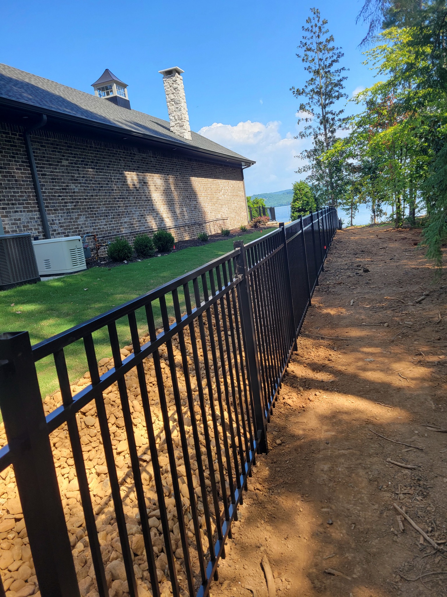 Black ornamental fence installed by Hooks Fence Company in Guntersville Alabama