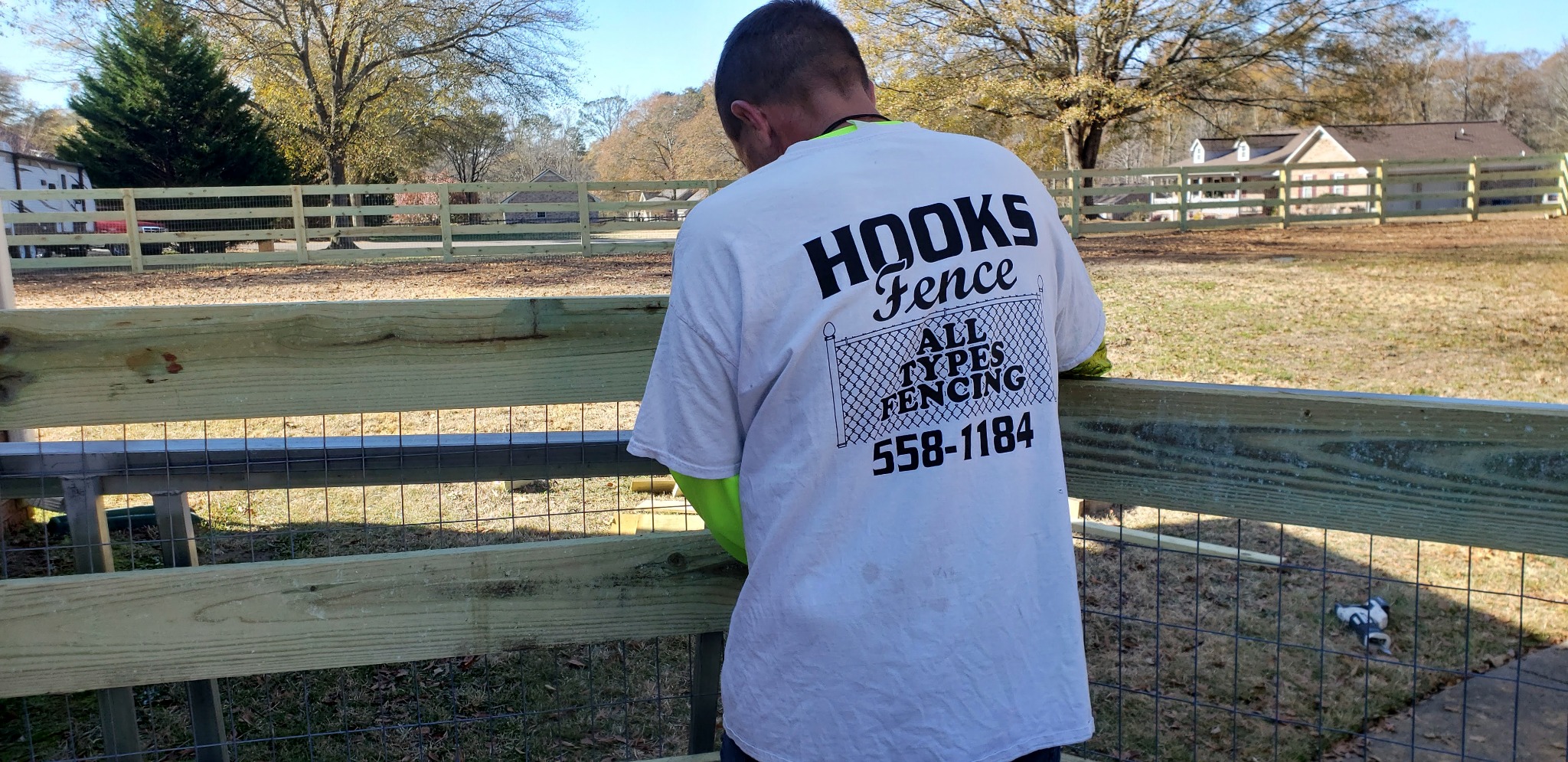 4-rail wood ranch fence in Oneonta, Alabama installed by Hooks Fence Company