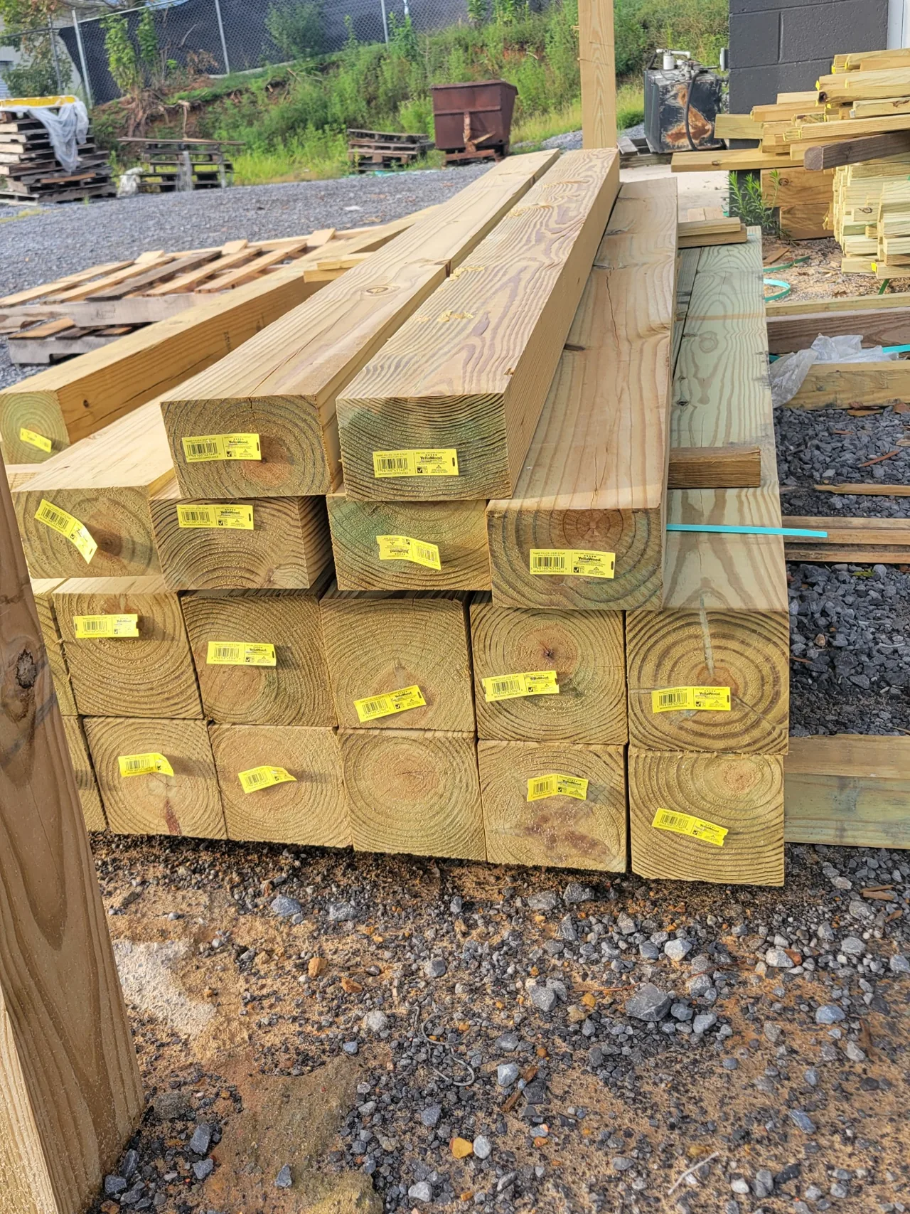 Heavy-duty 4x6 and 6x6 pressure-treated wood fence posts for gates and commercial fencing at Hooks Fence Company