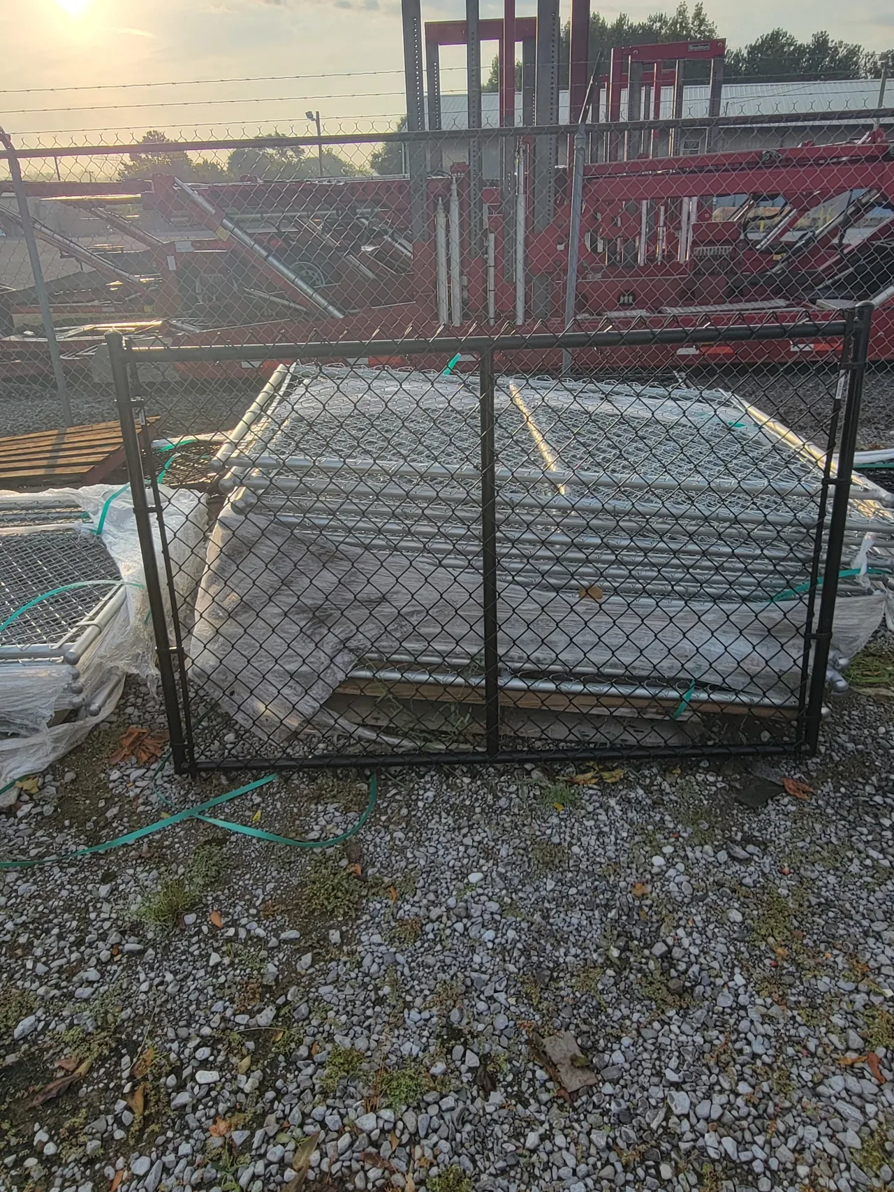 Black vinyl-coated residential chain-link gate stocked by Hooks Fence Company in Boaz Alabama