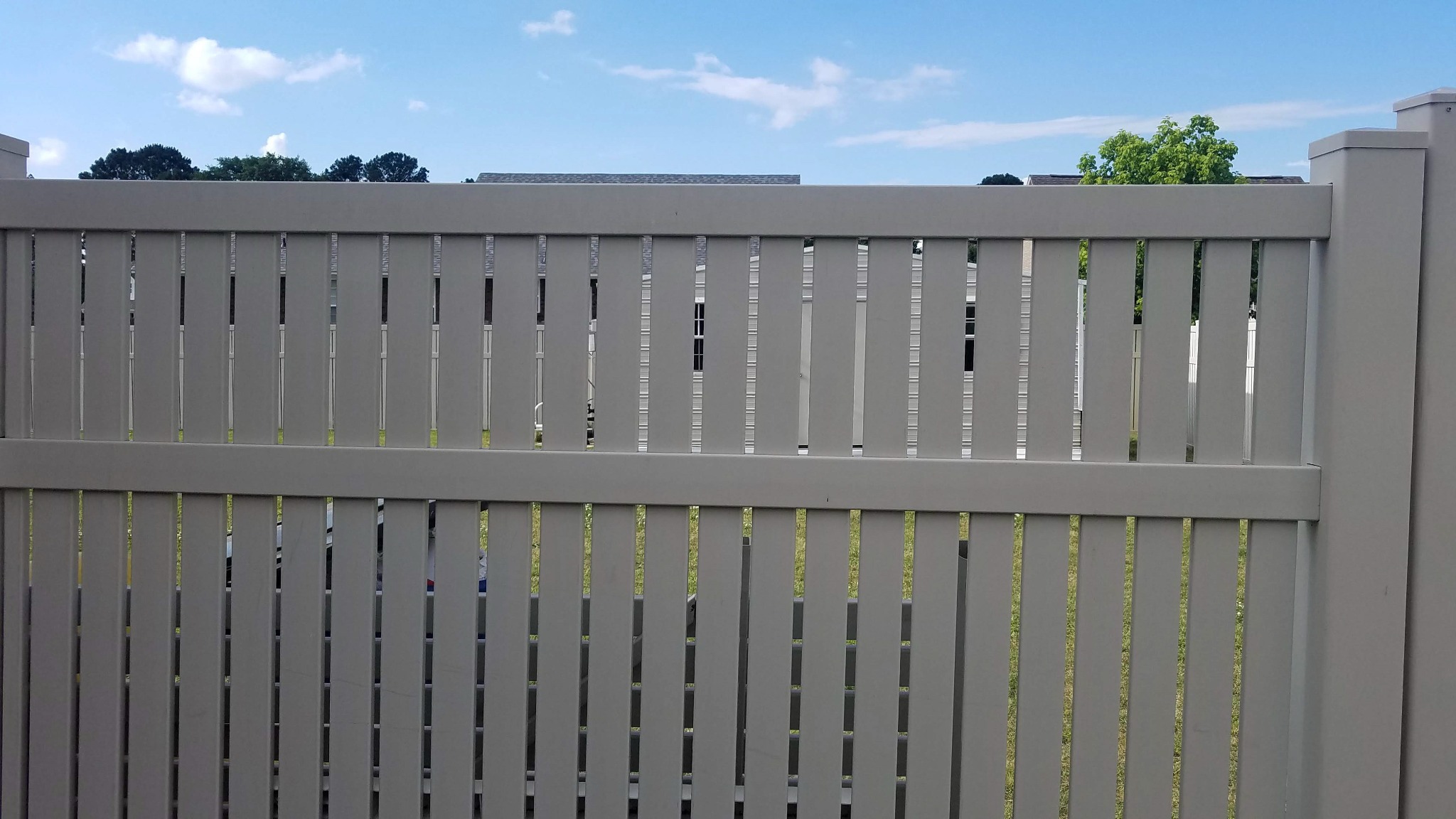 6-foot semi-privacy vinyl fence in Oneonta, Alabama installed by Hooks Fence Company
