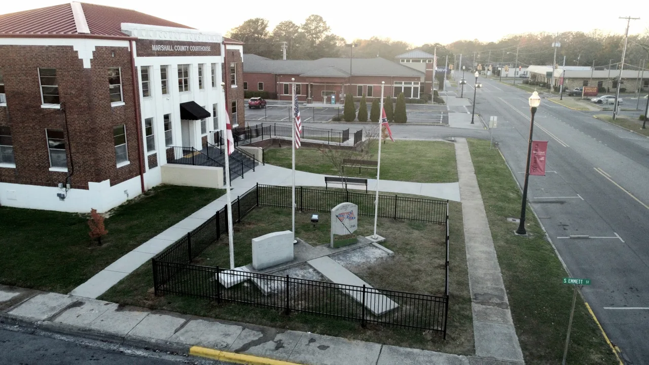 Ornamental fence around veterans monument at Marshall County Courthouse in Albertville Alabama installed by Hooks Fence Company