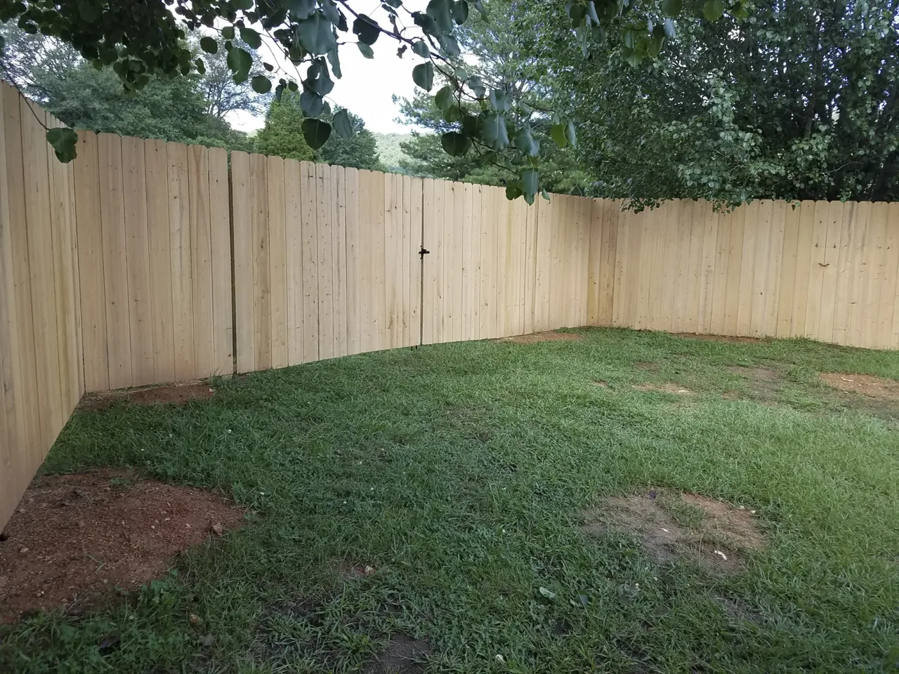 Wood privacy fence installed by Hooks Fence Company in Boaz Alabama
