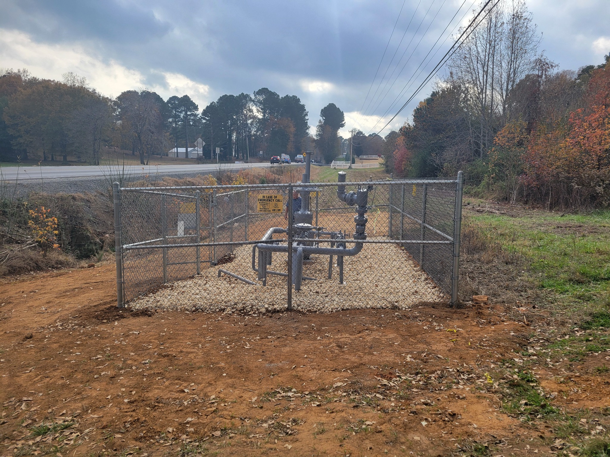 Galvanized chain-link commercial utility security enclosure installed by Hooks Fence Company in Scottsboro Alabama