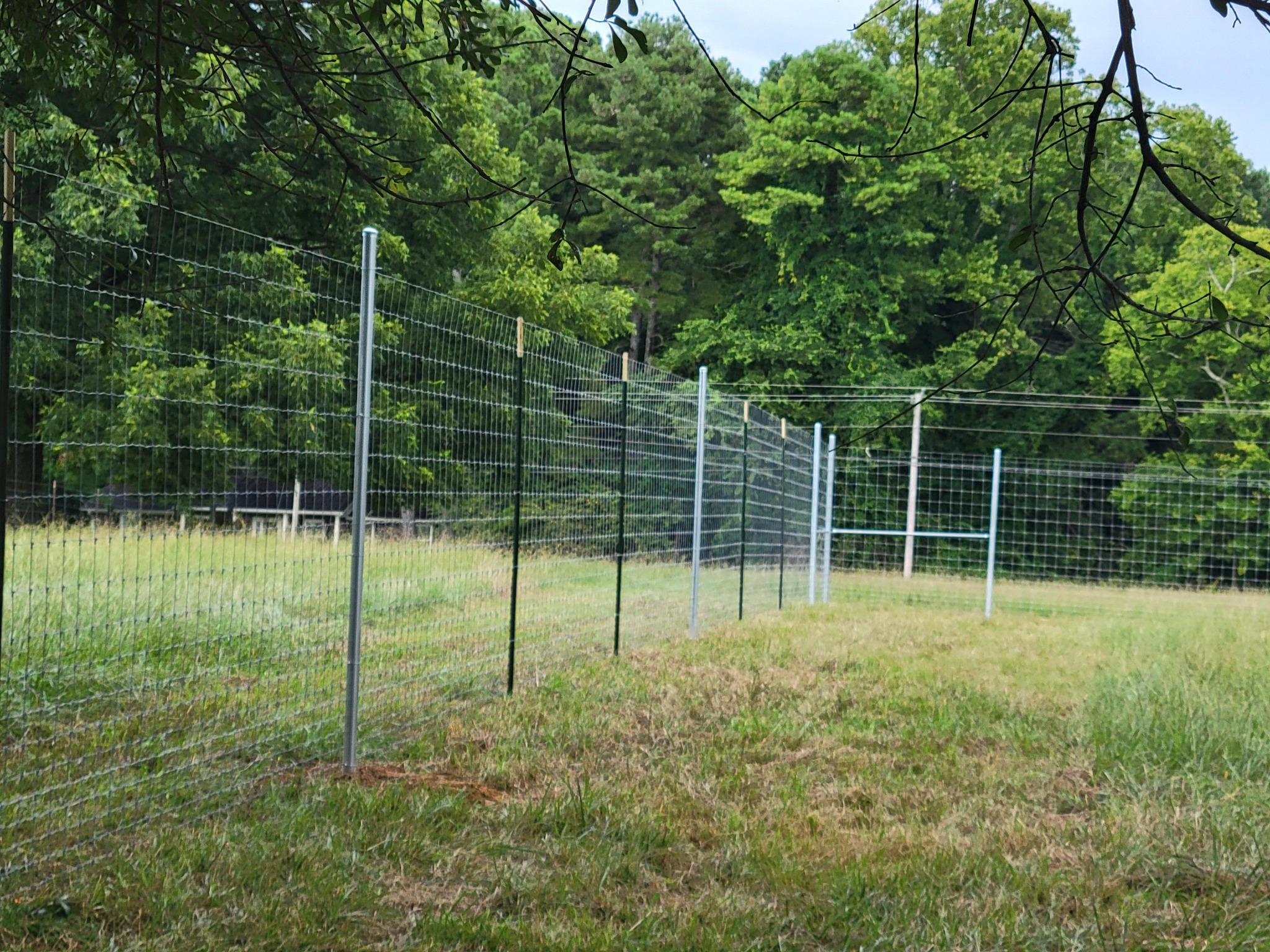 Deer and agricultural woven-wire fencing installed by Hooks Fence Company in Sardis Alabama