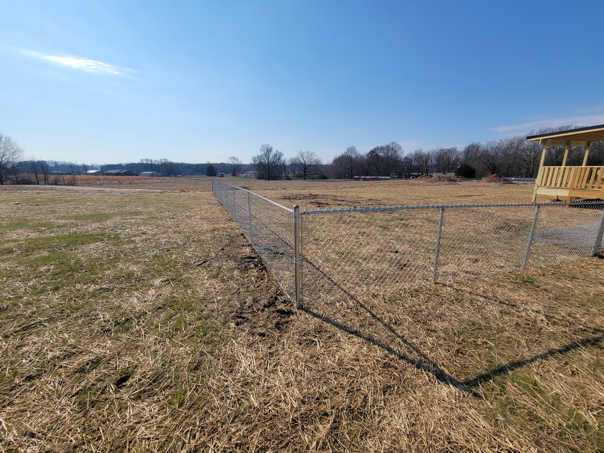 Galvanized chain-link fencing in Carlisle, Alabama installed by Hooks Fence Company