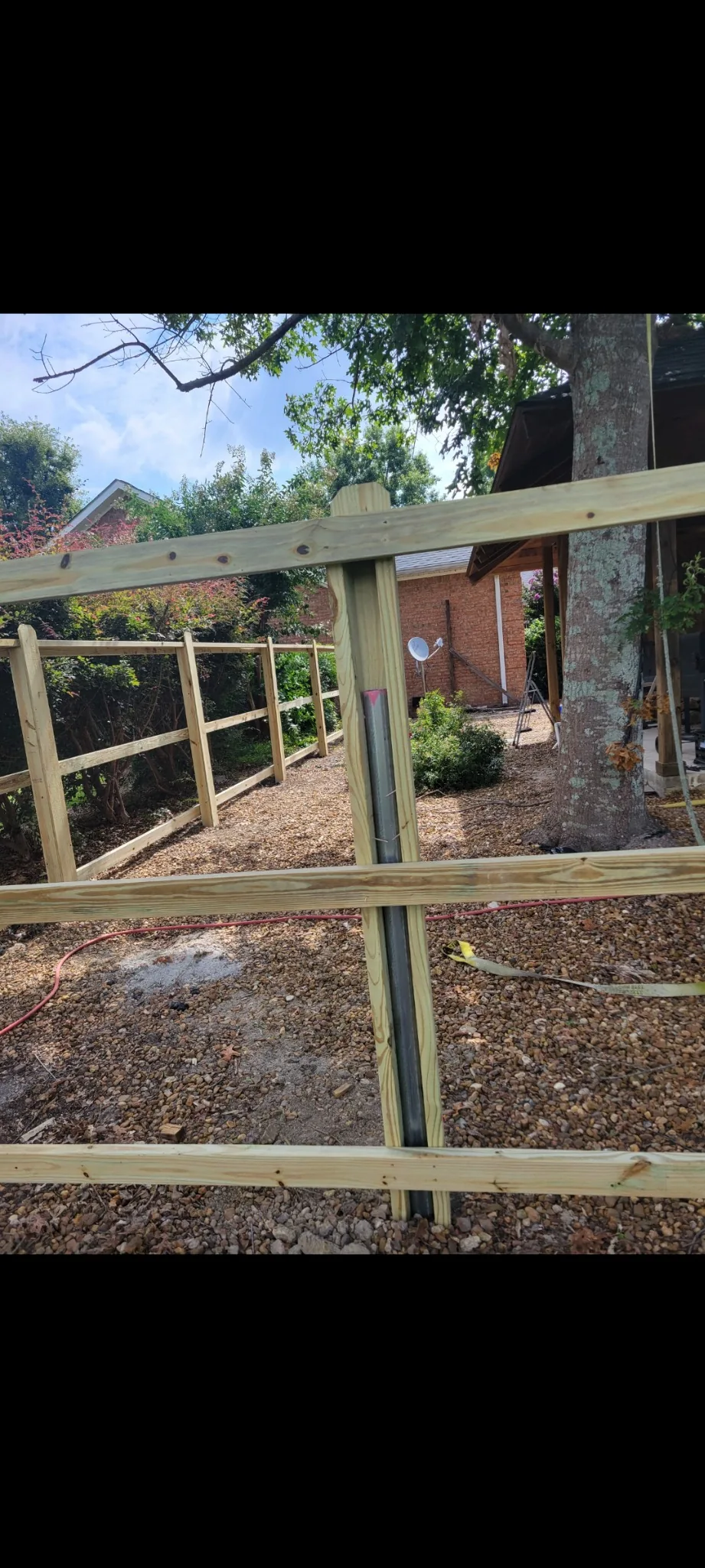 Wood privacy fence with steel posts in Centre, Alabama installed by Hooks Fence Company