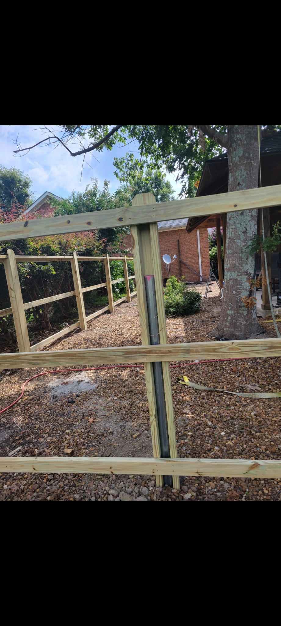 Wood privacy fence with steel posts in Centre, Alabama installed by Hooks Fence Company