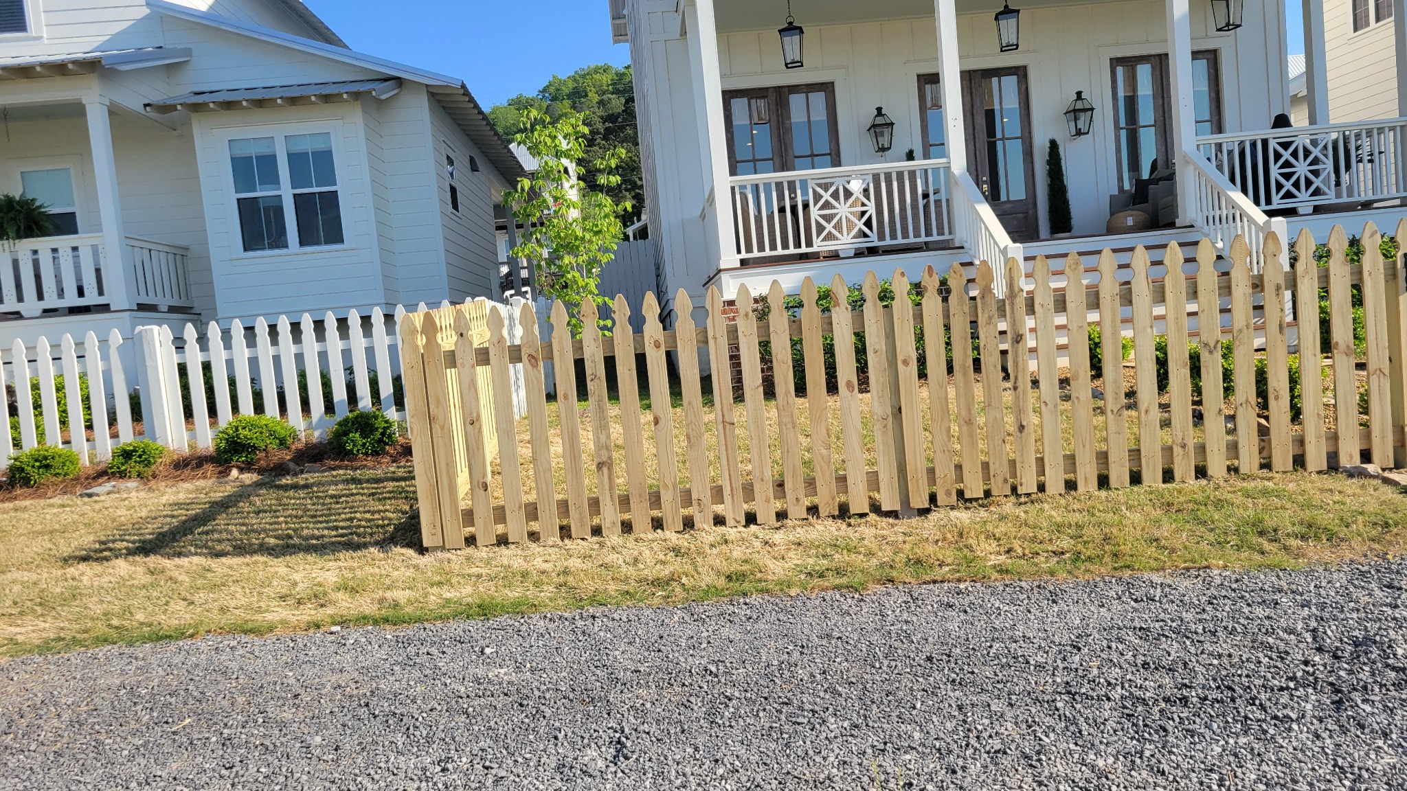 Wood picket fence in Guntersville, Alabama installed by Hooks Fence Company